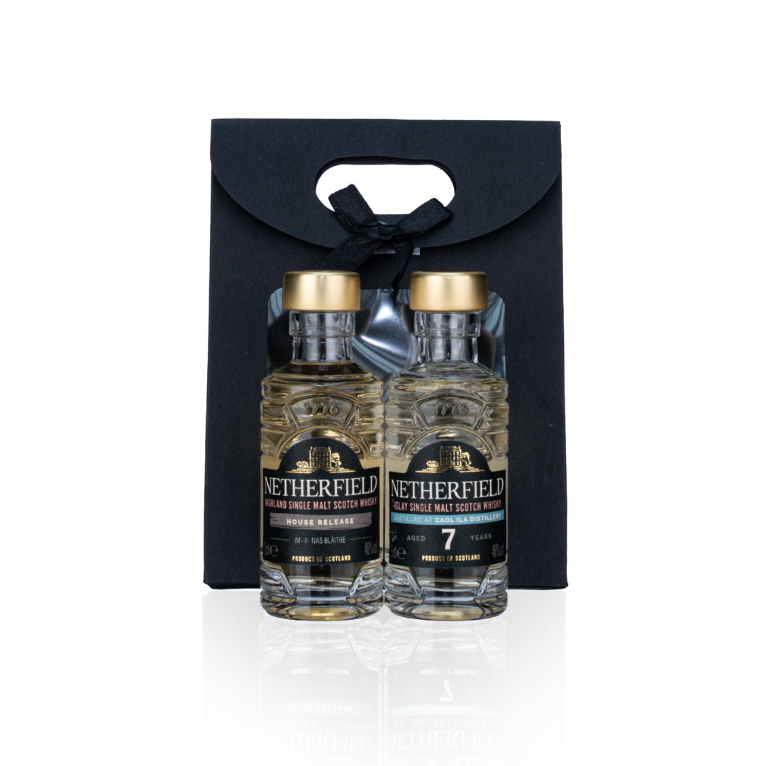 Discovery Set: House Release II and Caol Ila 7YO 5cl miniatures in a black gift bag